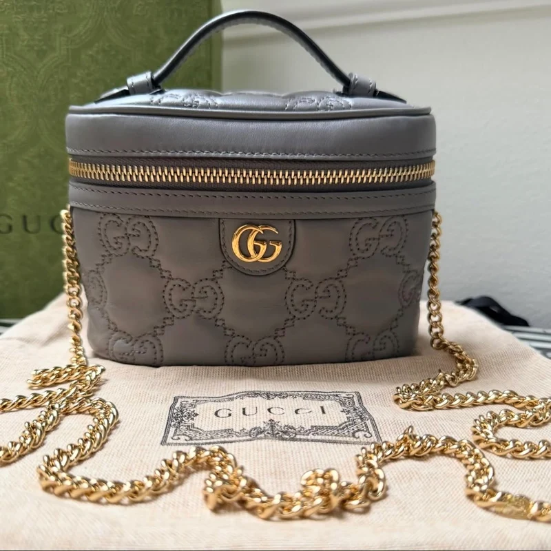 Borsa a tracolla Gucci GG Marmont Mini Top Handle, usata, colore grigio, modello n. 728770