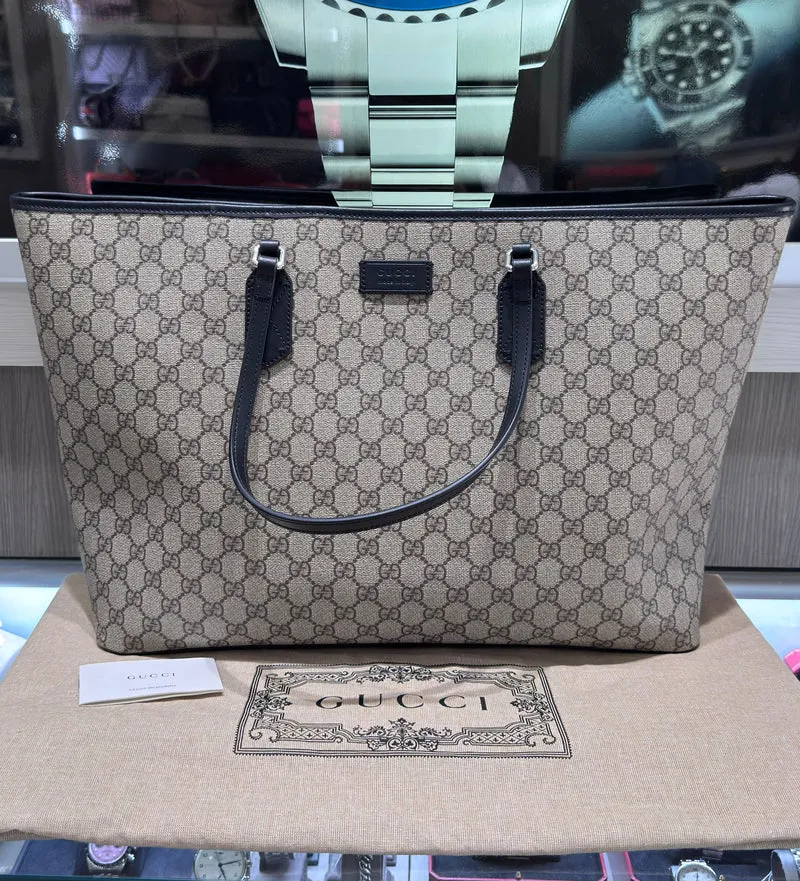 Borsa tote grande Gucci in tela Supreme nera e avorio, in ottime condizioni, codice 779864.