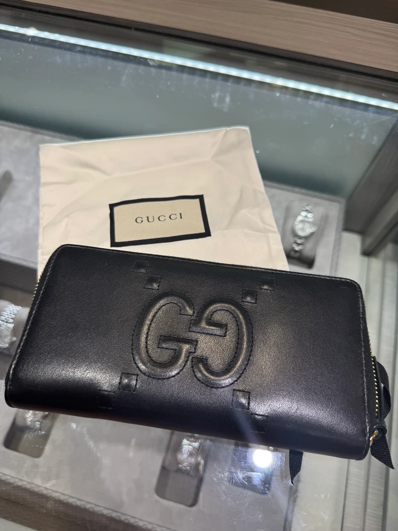 Portafoglio Gucci Apollo Dadini in pelle GG goffrata usato Stile: 453393