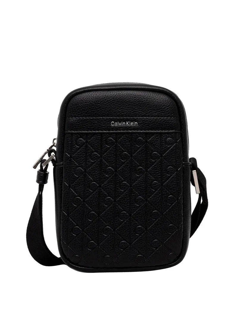 Calvin Klein Borsa A Tracolla Calvin Klein Emblem Aop Emboss Slim Reporter - Nero